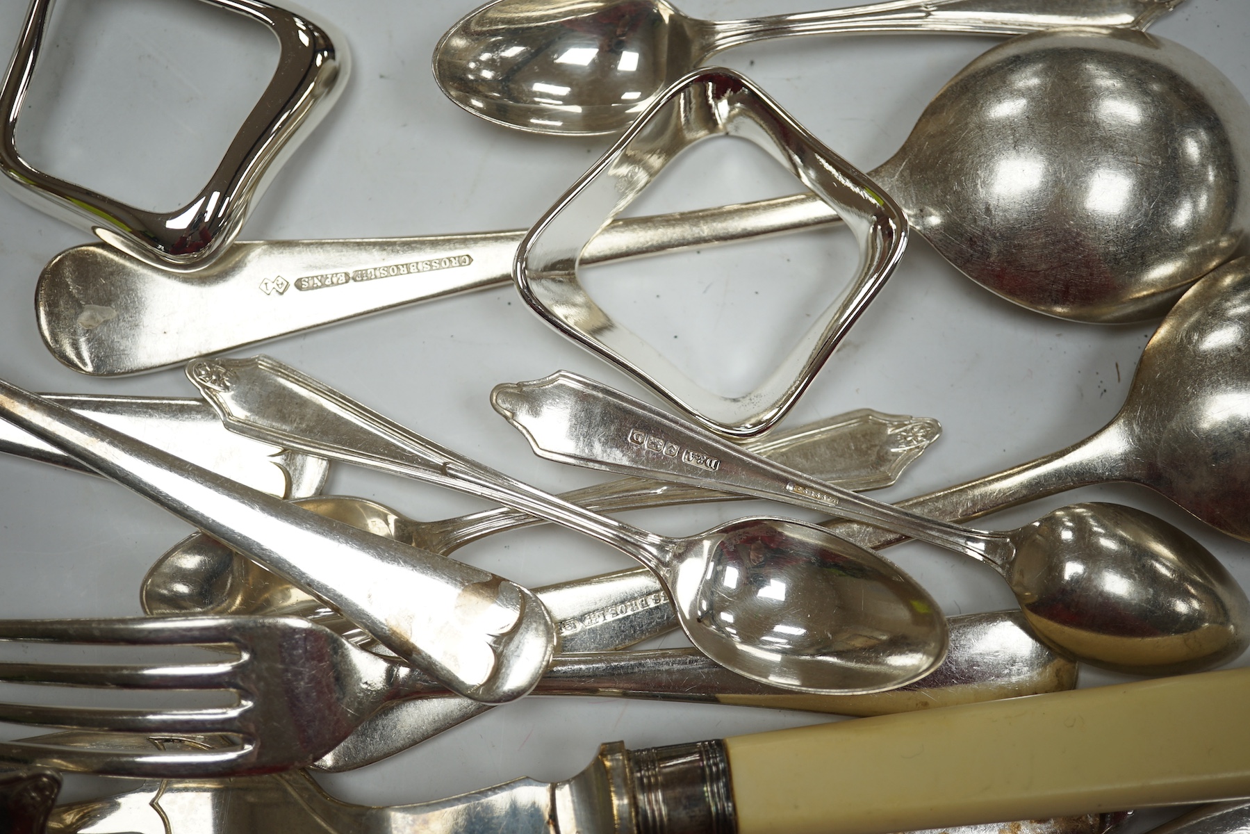 A William IV provincial silver fiddle pattern sauce ladle, John Langdon, Exeter, 1833, together with a set of six later silver coffee spoons, 4.9oz, together with a quantity of assorted plated flatware. Condition - fair